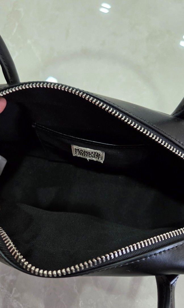 [AUTHENTIC] Marithe Mini Bowling Bag (Category: Shoulder Bags) located in Singapore. Submitted by tyingyun (Listing ID 1358408433, Image 5). Description: Bought from MFG store in Seoul. Spacious? simple trendy design that matches all outfits. Details on dimension and materials in last pic. Dust bag included..