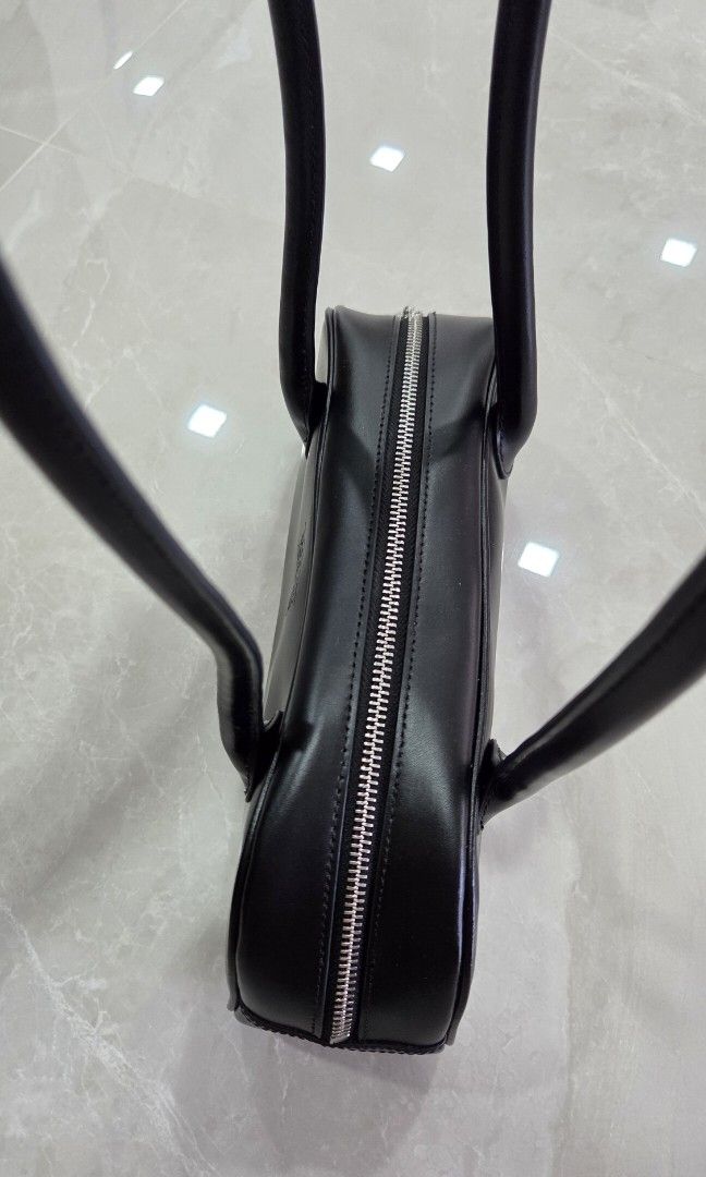 [AUTHENTIC] Marithe Mini Bowling Bag (Category: Shoulder Bags) located in Singapore. Submitted by tyingyun (Listing ID 1358408433, Image 4). Description: Bought from MFG store in Seoul. Spacious? simple trendy design that matches all outfits. Details on dimension and materials in last pic. Dust bag included..
