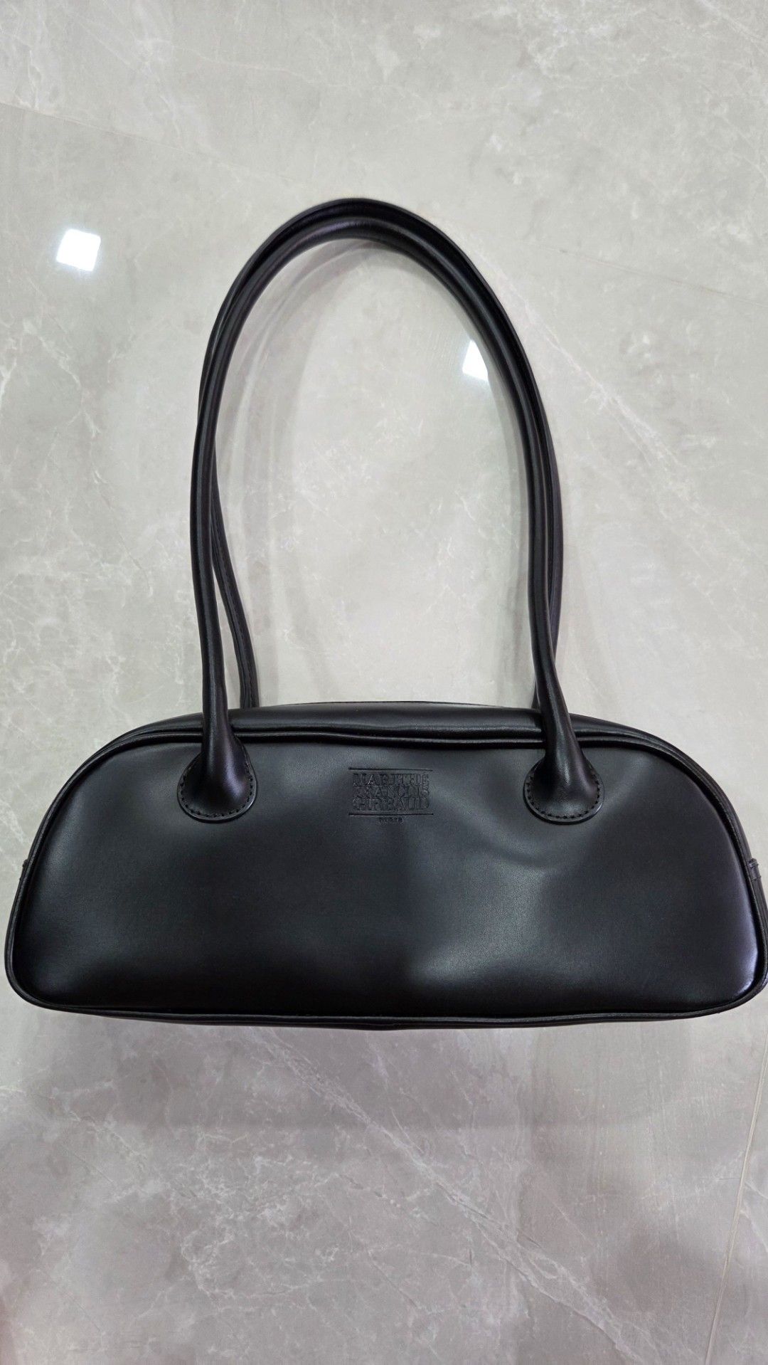 [AUTHENTIC] Marithe Mini Bowling Bag (Category: Shoulder Bags) located in Singapore. Submitted by tyingyun (Listing ID 1358408433, Image 2). Description: Bought from MFG store in Seoul. Spacious? simple trendy design that matches all outfits. Details on dimension and materials in last pic. Dust bag included..
