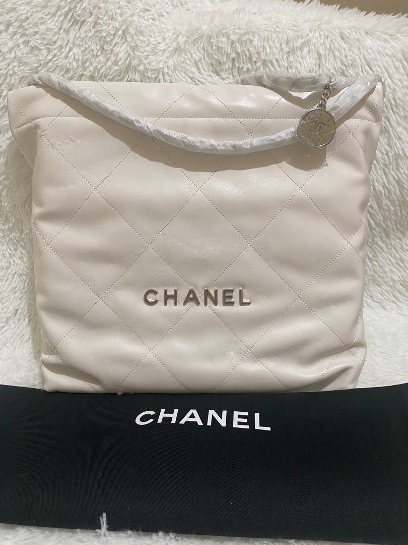 Chanel 22 Medium in Beige, Silver Hardware (Category: Luxury Bags & Wallets) located in Makati City. Submitted by secondlyf (Listing ID 1358383399, Image 1). Description: ✨ Timeless Elegance: Chanel 22 Medium in Beige with Silver Hardware ✨ The perfect blend of casual luxury and effortless chic—meet the Chanel 22 Medium in Beige, adorned with stunning Silver Hardware. A modern classic designed for everyday sophistication, this beauty features sof