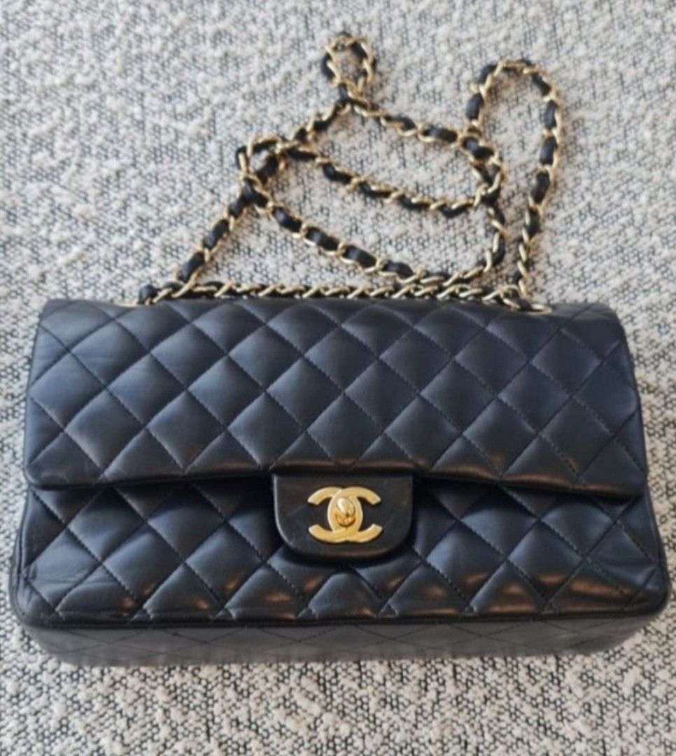 Chanel classic flap (Category: Bags & Wallets) located in Singapore. Submitted by shoppieq (Listing ID 1358393326, Image 1). Description: ** FIRE SALES *** Chanel classic double flap medium lamb skin, 24k GHW 13 series Entry level to own your 1st authentic CF at a steal Original dustbag, Box, and entrupy cert included fussy buyer and lower baller pls stay clear 🚫.