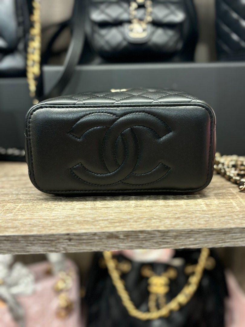 CHANEL 23C Vanity Bag (Ball Crush) (Category: Bags & Wallets) located in Singapore. Submitted by mybabybreathisyou (Listing ID 1358504725, Image 2). Description: - comes in full set (purchased in Spore) - condition: almost BRAND NEW (used once only) - chain is adjustable - keen buyers, feel free to request for more photos 😀😀😀.