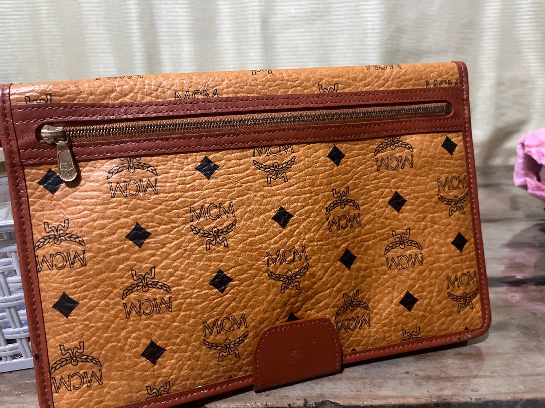 clutch (Category: Luxury Bags & Wallets) located in Quezon City. Submitted by yumiizashop (Listing ID 1358537640, Image 3). Description: 100% original mcm made in germany.