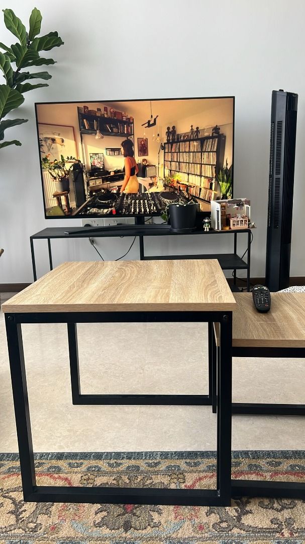 Coffee table - 2 stackable (Category: Tables & Sets) located in Singapore. Submitted by burrataboo (Listing ID 1358401600, Image 2). Description: 2 coffee tables, can be stacked or used separately Dimensions(L*W*H):Large Table: W50XD50xH50cm; Small table: W40XD40xH40cm.
