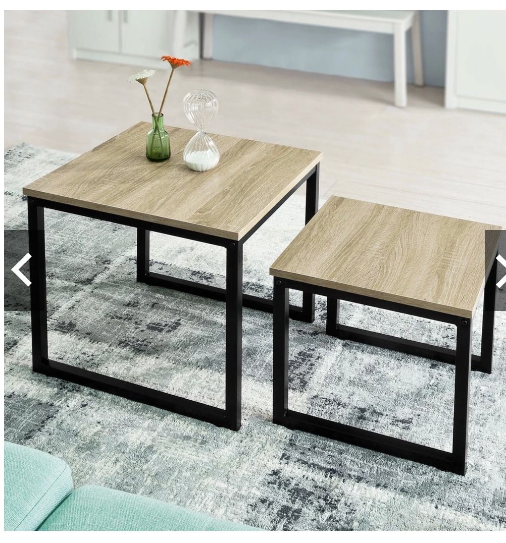 Coffee table - 2 stackable (Category: Tables & Sets) located in Singapore. Submitted by burrataboo (Listing ID 1358401600, Image 1). Description: 2 coffee tables, can be stacked or used separately Dimensions(L*W*H):Large Table: W50XD50xH50cm; Small table: W40XD40xH40cm.