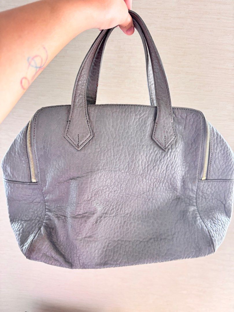 Couronne Bag (Category: Tote Bags) located in Mandaluyong City. Submitted by jdlreal (Listing ID 1358346070, Image 2). Description: Color: Gray Tote bag / Crossbody bag This bag fits a lot! With 2 compartments and really spacious. Lightly used with minimum flaws. Gold matte hardware. .