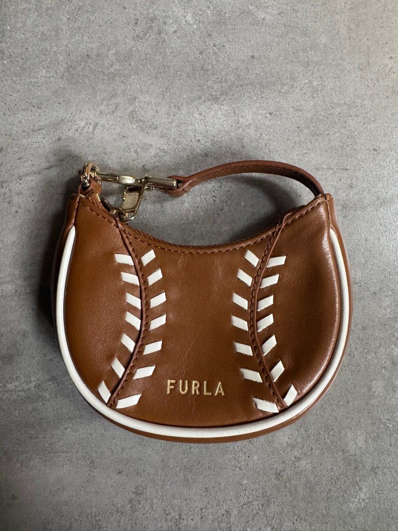 Furla Mini clutch bag cute purse (Category: Luxury Bags & Wallets) located in Mandaluyong City. Submitted by destash_manda (Listing ID 1358400574, Image 1). Description: Cute mini bag purse.