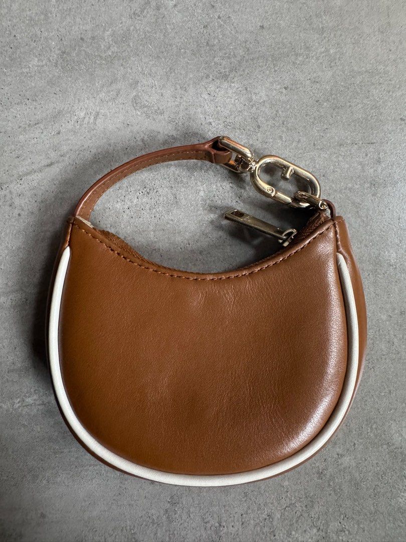 Furla Mini clutch bag cute purse (Category: Luxury Bags & Wallets) located in Mandaluyong City. Submitted by destash_manda (Listing ID 1358400574, Image 2). Description: Cute mini bag purse.