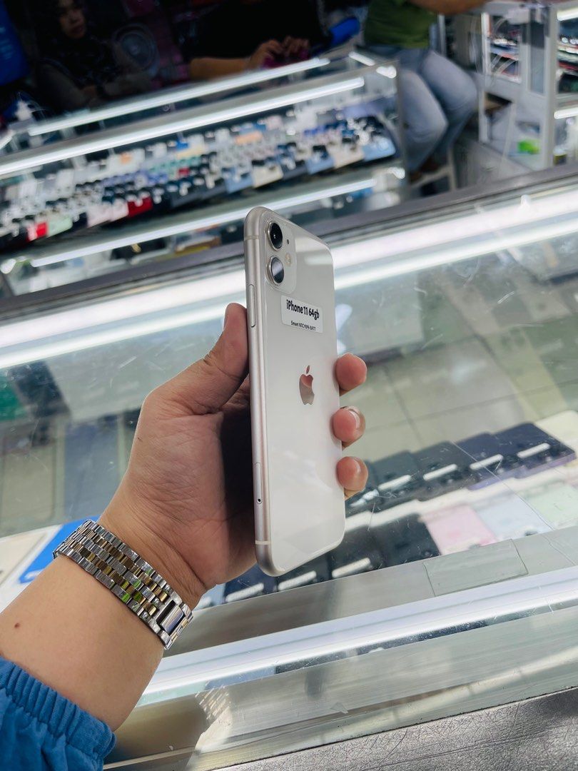 Iphone 11 64g 93% batt Smartlocked NTC (Category: iPhone 11 Series) located in San Juan City. Submitted by javedsgadgetshop (Listing ID 1358471917, Image 2). Description: INSTALLMENT OPTIONS : SPAY LATER / GGIVES / CREDIT CARD! WE BUY AND SELL SO PWEDE MAGBINTA OR SWAP ! Quick Specs : Iphone 11 •64gb •NTC Variant •93% batt health •Smartlocked •95% Smoothness •No hidden issue | No Repaired •100% Authentic | Not Refurbished •w/ OEM Charger & store 