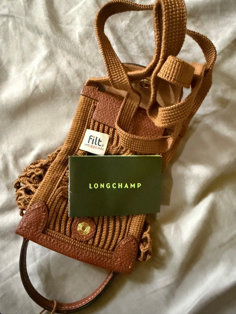 Longchamp Le Pliage Filet Mesh Bag XS (Category: Luxury Bags & Wallets) located in Iloilo. Submitted by cassandrasofia (Listing ID 1358409991, Image 3). Description: brand new, never been used can send more pictures purchased at rustan's negotiable.
