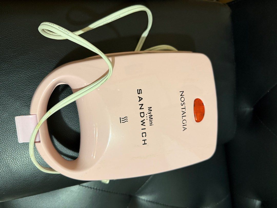 NOSTALGIA MINI SANDWICH MAKER (Category: Cookers) located in Pasig City. Submitted by nini2324 (Listing ID 1358529047, Image 1). Description: This item is brand new, just removed from the box..