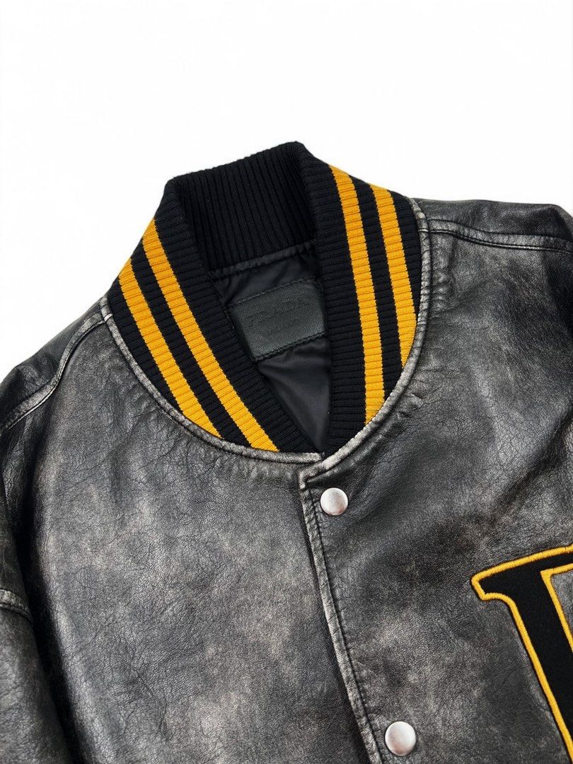 ⚜️Prada leather Varsity Jacket (Category: Luxury Apparel) located in Makati City. Submitted by 90sangel (Listing ID 1358479307, Image 3). Description: •Item: Prada varsity leather - from look #88 / 154 prada runway ⚜️ •Size: M 23" x 26" •Condition: Excellent! no hidden issues *This includes original paperbag ~ as seen on Blackpink Jennie 🖤🩷 & woo seok.