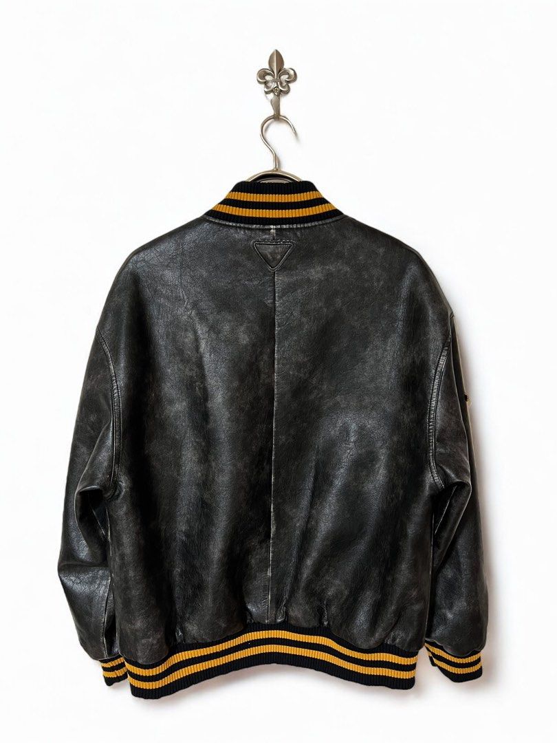 ⚜️Prada leather Varsity Jacket (Category: Luxury Apparel) located in Makati City. Submitted by 90sangel (Listing ID 1358479307, Image 2). Description: •Item: Prada varsity leather - from look #88 / 154 prada runway ⚜️ •Size: M 23" x 26" •Condition: Excellent! no hidden issues *This includes original paperbag ~ as seen on Blackpink Jennie 🖤🩷 & woo seok.