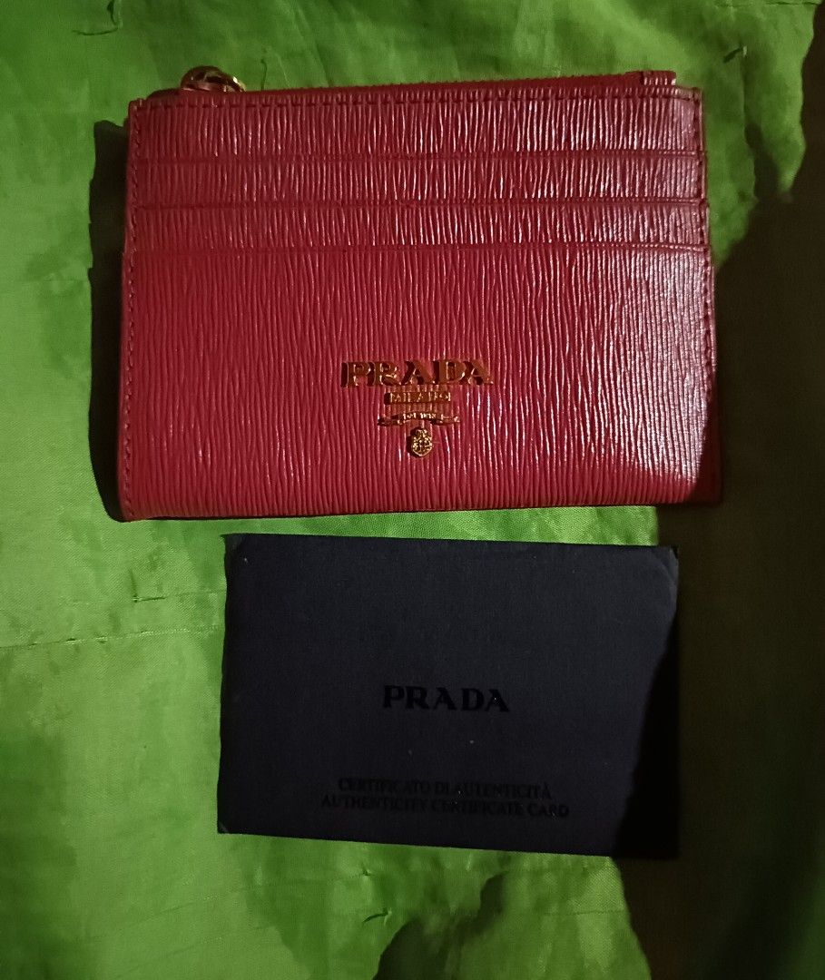 Prada Vitello (Category: Luxury Bags & Wallets) located in Makati City. Submitted by blessedlupie (Listing ID 1353855962, Image 2). Description: slight chipping on the folded area of wallet not visible.