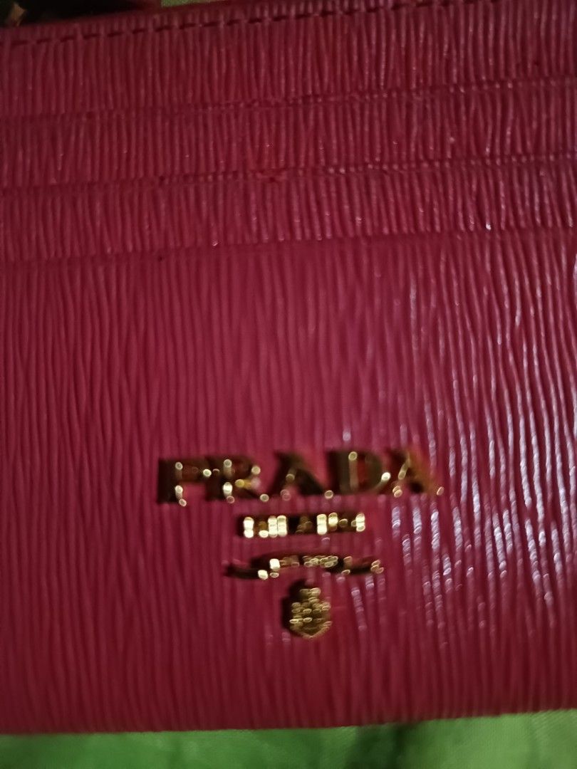 Prada Vitello (Category: Luxury Bags & Wallets) located in Makati City. Submitted by blessedlupie (Listing ID 1353855962, Image 1). Description: slight chipping on the folded area of wallet not visible.