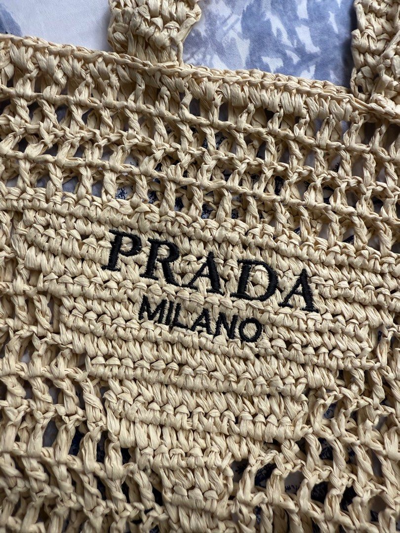 Raffia Tote Bag Prada (Category: Luxury Bags & Wallets) located in Quezon City. Submitted by arriaB (Listing ID 1358394580, Image 2). Description: Used twice, Rfs: decluttering Slight nego .