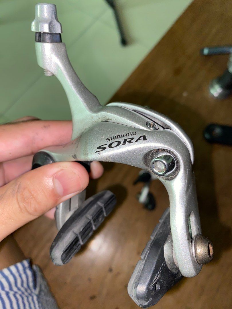 Shimano sora caliper brakes (Category: Bicycles) located in Quezon City. Submitted by krystorei (Listing ID 1358348896, Image 2). Description: negotiable light scratch on front caliper.