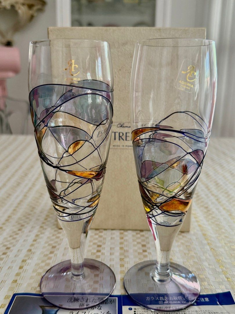 Wine glasses (Category: Other Kitchenware & Tableware) located in Mandaluyong City. Submitted by daisys.collection (Listing ID 1358444935, Image 2). Description: Aderia Romania Estremo Chamois wine glasses. Lavander and gold design Height = 7.8 in / 20 cm Diameter = 2 in /5.5 cm Only 1 pair in a box available.