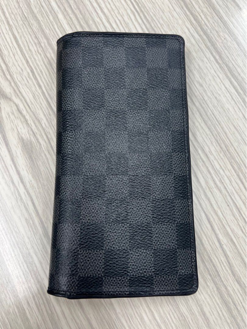 Authentic LV Damier graphite long wallet (Category: Luxury Bags & Wallets) located in Cagayan de Oro. Submitted by riggstuffs (Listing ID 1358560359, Image 1). Description: ➡️ Guaranteed Authentic LV Damier graphite bifold long wallet ➡️ with code ➡️ in very good condition ➡️ previously owned as shown with the owners initials ➡️ Rank A - A- in condition Disclaimer: Riggstuffs is not associated or affiliated with the brand posted. All copyrights a