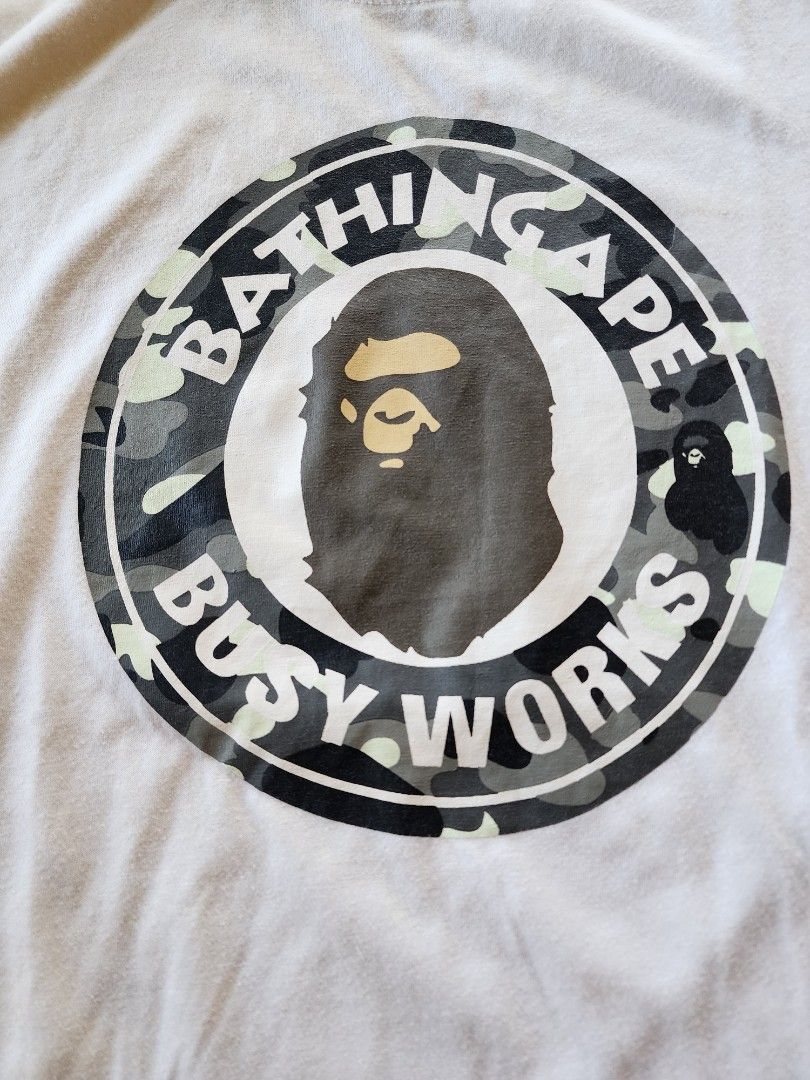 Classic Bape by Bathing Ape (Category: Tshirts & Polo Shirts ) located in Antipolo. Submitted by saslbs (Listing ID 1358552240, Image 2). Description: 🤍Classic Bape Bathing Ape busy works made in Japan in good condition. 1.5k Payment thru g-cash. Delivery thru Lbc or lalamove care of buyer ..