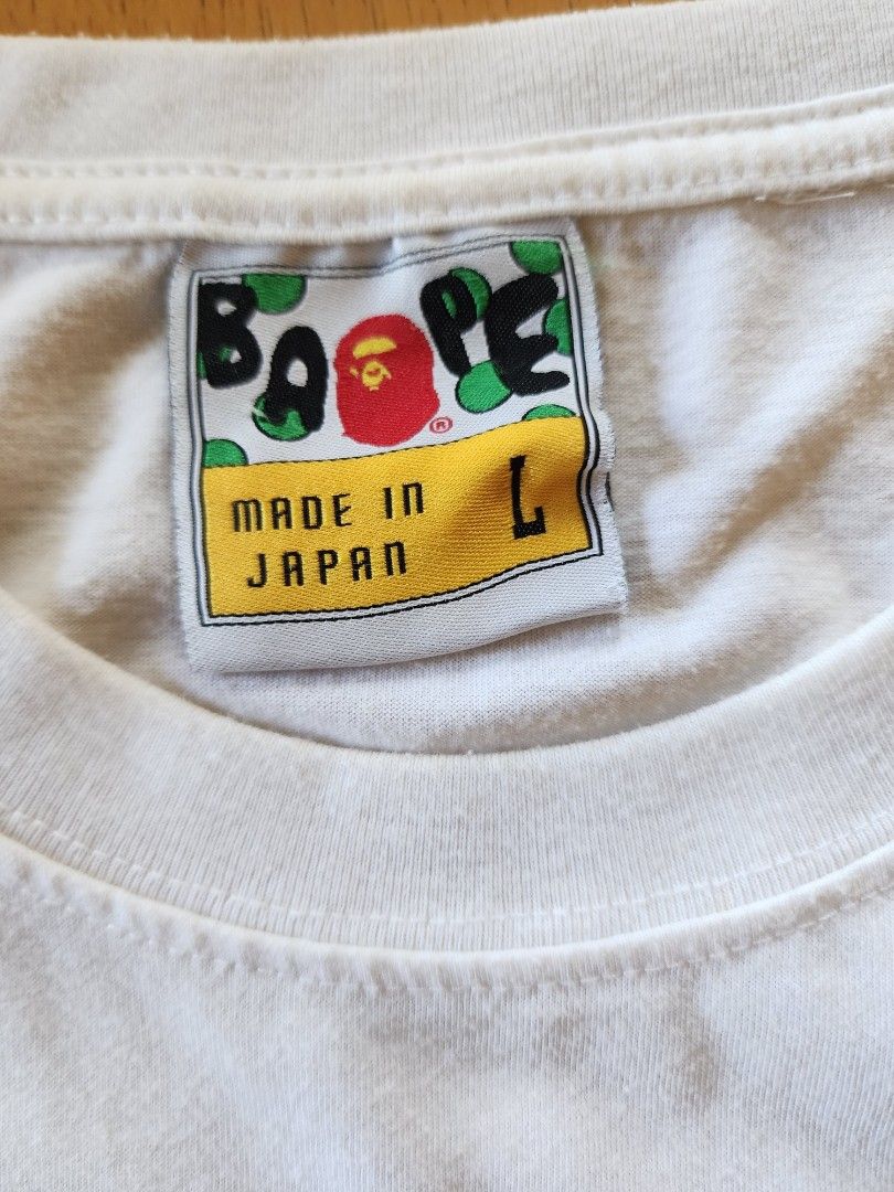Classic Bape by Bathing Ape (Category: Tshirts & Polo Shirts ) located in Antipolo. Submitted by saslbs (Listing ID 1358552240, Image 3). Description: 🤍Classic Bape Bathing Ape busy works made in Japan in good condition. 1.5k Payment thru g-cash. Delivery thru Lbc or lalamove care of buyer ..