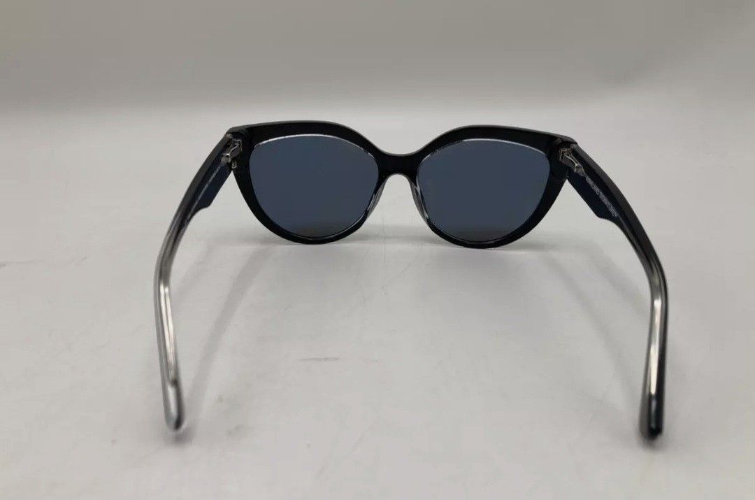 Black Polarized Crystal Smoke Grey Sunglasses (Category: Sunglasses & Eyewear) located in Makati City. Submitted by loooved (Listing ID 1358545451, Image 3). Description: used only twice like new, bought in the US for P2,600+ with black case and wipe cloth.