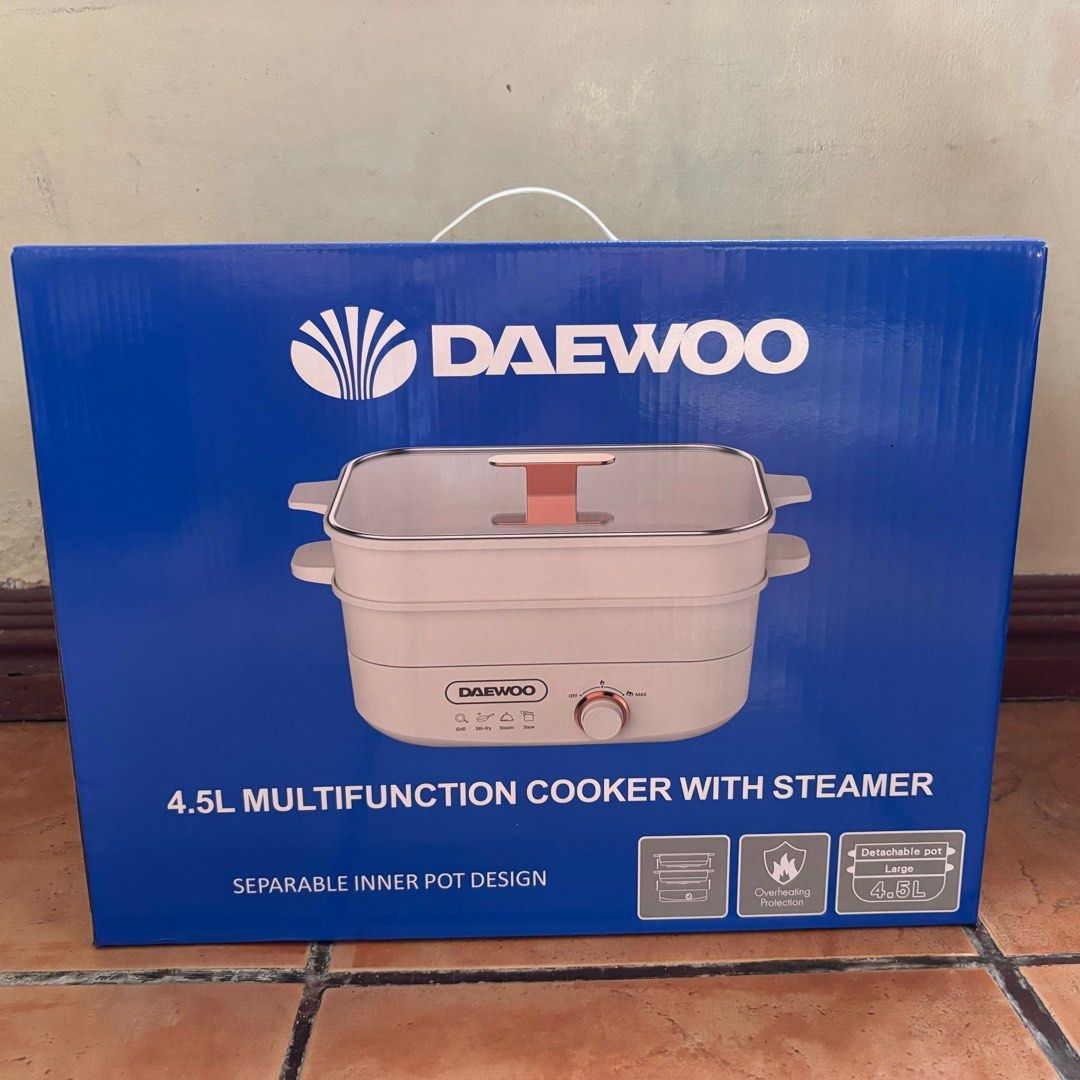 Daewoo Multifunction Cooker with Steamer (Category: Cookware & Accessories) located in Manila. Submitted by rbstyles15 (Listing ID 1358626812, Image 2). Description: 4.5L Multifunction Cooker with Steamer Model: DEMC-45LCRM Power: 1350W Voltage: 220-240V Frequency: 50-60Hz Net weight: 3.05 kg Size: 412(L) x 266(W) x 315(H)mm.