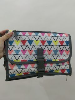 Diaper changing clutch