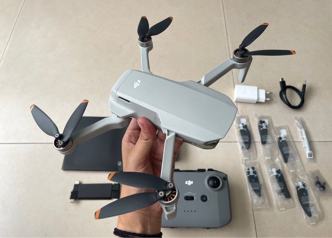 DJI MINI 2 Fly more combo (Category: Drones) located in Pasig City. Submitted by nysabelleee (Listing ID 1358558508, Image 2). Description: DJI Mini 2 DRONE Includes: -1x Remote control -3x Intelligent Flight Battery -6x Pair of Spare Propellers -1x Gimbal Protector -1x USB-C Data Cable -3x RC Cable (USB-C, Lightning, Micro USB) (1 each) -2x Spare control sticks -18x Spare Screws -1x Screwdriver -1x Propeller Holder -1x Three-Way Charging Hub -1x