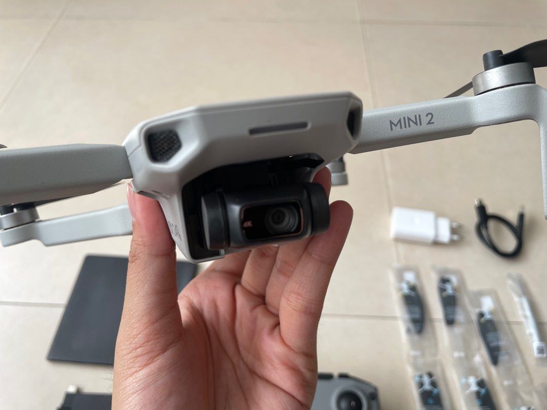 DJI MINI 2 Fly more combo (Category: Drones) located in Pasig City. Submitted by nysabelleee (Listing ID 1358558508, Image 3). Description: DJI Mini 2 DRONE Includes: -1x Remote control -3x Intelligent Flight Battery -6x Pair of Spare Propellers -1x Gimbal Protector -1x USB-C Data Cable -3x RC Cable (USB-C, Lightning, Micro USB) (1 each) -2x Spare control sticks -18x Spare Screws -1x Screwdriver -1x Propeller Holder -1x Three-Way Charging Hub -1x