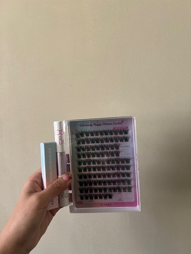 ELYZZA FLUFFY LASH CLUSTERS SET (with 4in1 bond & tweezers) (Category: Makeup) located in Las Pinas. Submitted by samuellepbarja (Listing ID 1358627585, Image 1). Description: - Used only once , as seen in the pic - glue - 300 - lashes - 200 - tweezers is unopened rfs: not my style.