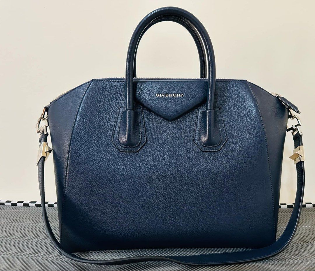 Givenchy Medium Antigona Navy (Category: Luxury Bags & Wallets) located in Taytay. Submitted by intricacies.ph (Listing ID 1358604673, Image 2). Description: Guaranteed 100% Original Givenchy Medium Antigona Color: Navy Condition: 9/10 with dust bag ₱45,000.