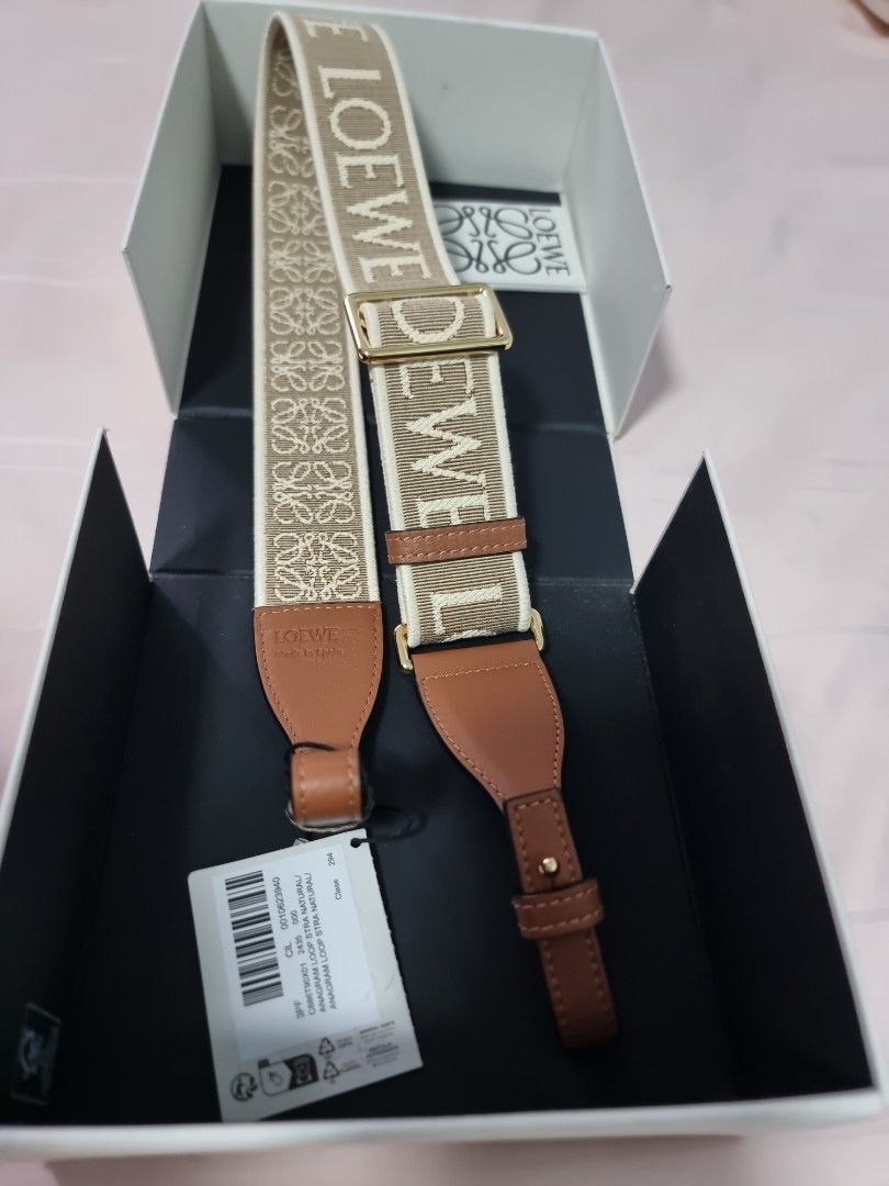 Loewe Anagram Strap (Category: Bags & Wallets) located in Singapore. Submitted by ketoot (Listing ID 1358539708, Image 1). Description: Retails in SG stores at $1150 Anagram loop strap Colour: natural In jacquard and calf skin Comes with dust bag..