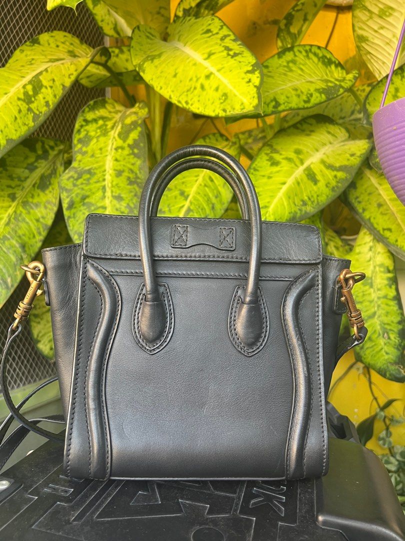 Preloved Celine Nano Luggage (Category: Luxury Bags & Wallets) located in Quezon City. Submitted by bebelablabnimylad (Listing ID 1358632790, Image 2). Description: Preloved Celine Nano Luggage Black Material: Black Smooth Calfskin Leather Hardware: Gold Features: Pockets: Interior Flat Pocket, Exterior Zipper Pocket Bag style: Shoulder Bag / Top Handle Closure type: Zipped Closure Inclusions: Strap 📌VGUC 📌RFS: Need Cash 📌Shipping/Delivery : C