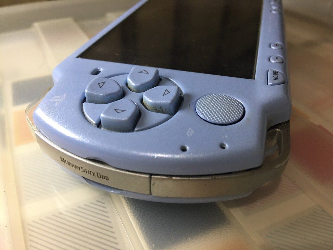 PSP-2000 PlayStation Portable (Category: PlayStation) located in Quezon City. Submitted by collectionneursonline88 (Listing ID 1358581388, Image 3). Description: ⚠️ PLEASE READ 🚫 Defective unit only 🚫 known issues - umd does not read games - no battery - no battery cover - analog thumb stick lubog / turns right - some screw missing / housing case slight loose - house case cracks - with power only while charging - does not read battery 🚫 other 