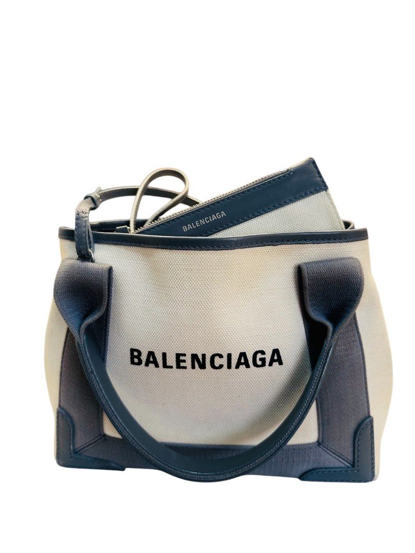 Shoulder/hand bag (Category: Luxury Bags & Wallets) located in Pasig City. Submitted by emashopaholic (Listing ID 1347213791, Image 2). Description: Preloved Authentic Balenciaga tote bag with long strap Canvas material Leather handle With pouch Generic dust bag only Excellent used condition Issue: no strap Location: Pasig Shipping c/o buyer MOP: Online transfer.