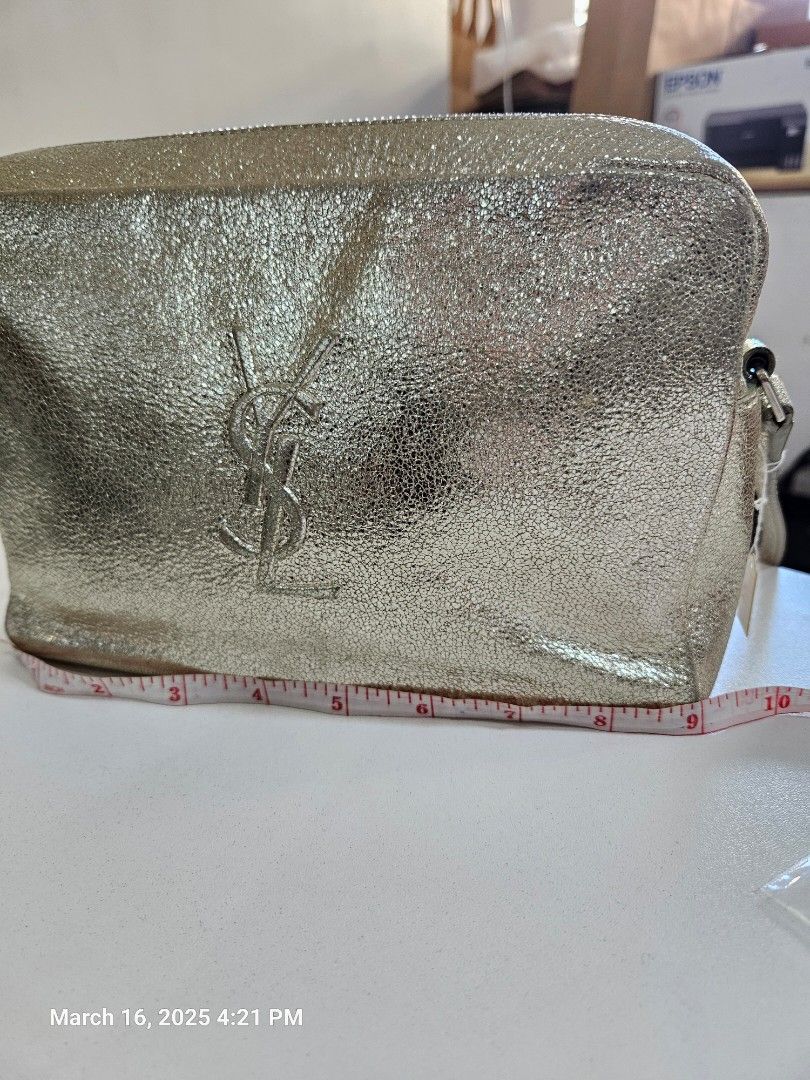 YSL light gold camera bag original (Category: Luxury Bags & Wallets) located in San Juan City. Submitted by rmdeclutter (Listing ID 1358626525, Image 3). Description: decluttering original with card missing tassel thus selling cheap.