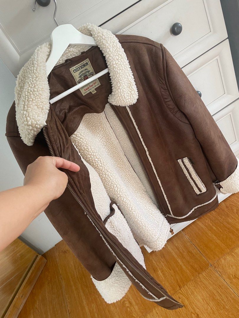 Authentic Chevignon Brown Sherpa Jacket (Category: Coats, Jackets and Outerwear) located in Quezon City. Submitted by virtualapproach (Listing ID 1358774489, Image 2). Description: 2XL on tag Super nice in actual!!! Like new!! No flaws Length 27.5 inches Width 22 inches laid flat measurement .