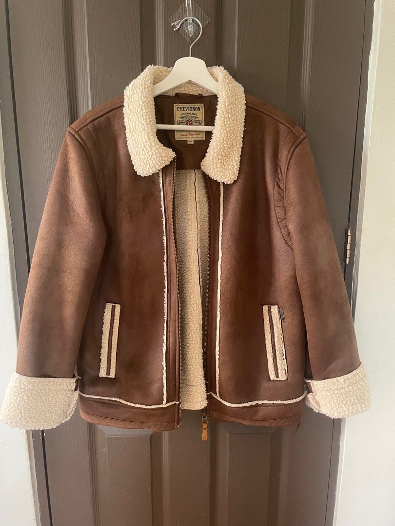 Authentic Chevignon Brown Sherpa Jacket (Category: Coats, Jackets and Outerwear) located in Quezon City. Submitted by virtualapproach (Listing ID 1358774489, Image 1). Description: 2XL on tag Super nice in actual!!! Like new!! No flaws Length 27.5 inches Width 22 inches laid flat measurement .