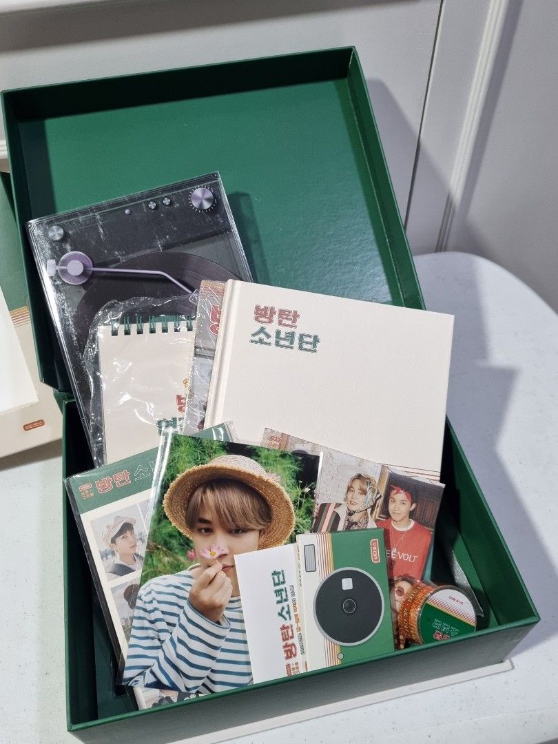BTS 2021 Season's Greetings (Category: K-Wave Merchandise) located in Manila. Submitted by dawn901 (Listing ID 1358811717, Image 2). Description: BTS Season’s Greetings 2021 - UNSEALED - Inclusions: Outbox, mini posters, desk calendar, diary, making DVD, photobook, ID photo set, polaroid DIY kit, 4x6 photo - Issue: Slight damages in outbox, slight tears in cardboard compartments.