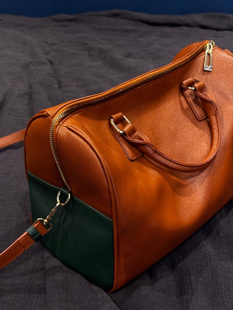 BTS V Taehyung Boston Bag (Category: Shoulder Bags) located in Quezon City. Submitted by secondninico (Listing ID 1358817449, Image 1). Description: Leather High Quality Copy, cheaper than original bag, but still great quality, selling cause my mom finally got the OG. Colour is a little lighter but still great build .