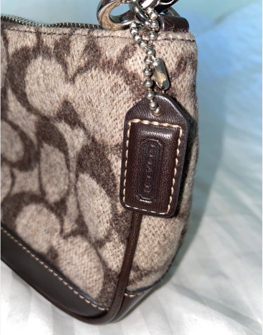 Coach Demi Wool Pochette Shoulder Bag (Category: Luxury Bags & Wallets) located in Manila. Submitted by maly01_ (Listing ID 1358894228, Image 3). Description: - Rare & Authentic (Japan-sourced ~ bought from a reliable seller) - Mint Condition / No Issues price is still negotiable :) .