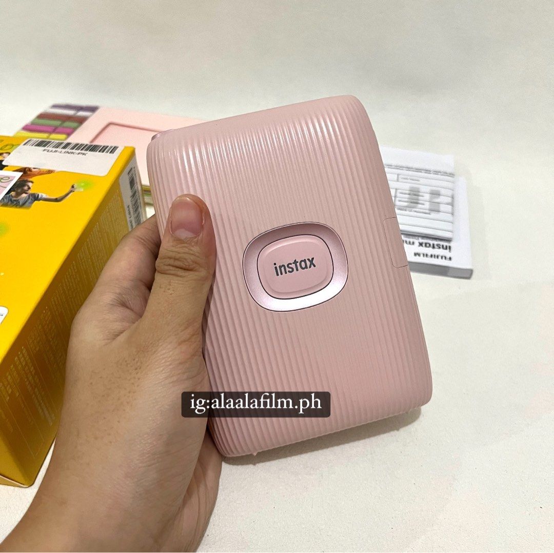INSTAX MINI LINK 2 (Category: Cameras) located in Bacoor. Submitted by masijakeopi_ (Listing ID 1358846317, Image 2). Description: ‼️SALE‼️Instax Mini Link 2 (Soft Pink) NOW: ₱5,500!!! LAST PRICE BEFORE: ₱5,800 Inclusion: ✓ Instax Printer ✓ Original Box & Manual ✓ Expired Warranty Card ✓ Free Film Stickers ✓ Frames & woodclips *NO FILM Included *Works well💯 *Physical Condition: 10/10 (almost new) *Tested before selling it. -PAYO, not available f