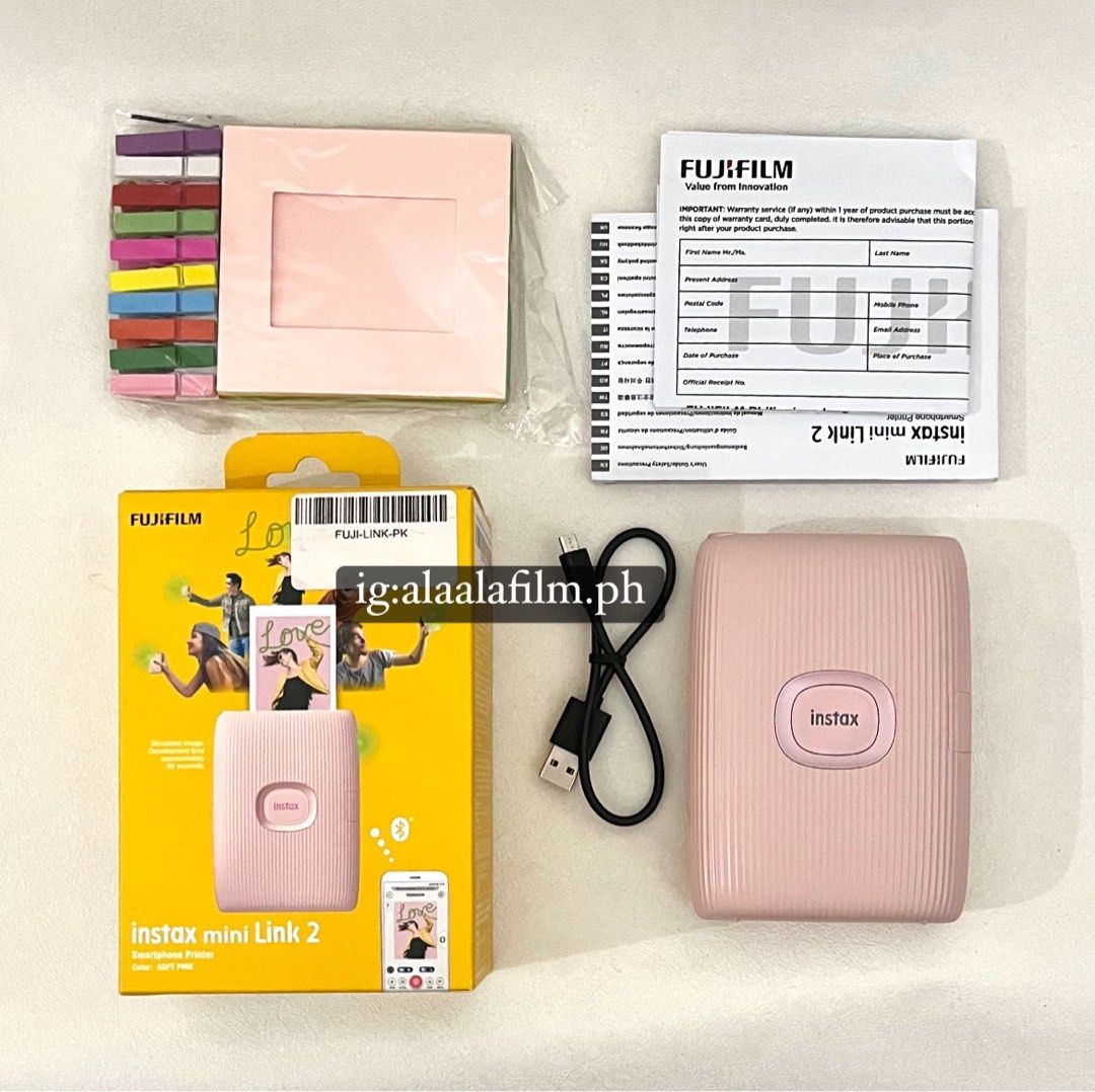INSTAX MINI LINK 2 (Category: Cameras) located in Bacoor. Submitted by masijakeopi_ (Listing ID 1358846317, Image 1). Description: ‼️SALE‼️Instax Mini Link 2 (Soft Pink) NOW: ₱5,500!!! LAST PRICE BEFORE: ₱5,800 Inclusion: ✓ Instax Printer ✓ Original Box & Manual ✓ Expired Warranty Card ✓ Free Film Stickers ✓ Frames & woodclips *NO FILM Included *Works well💯 *Physical Condition: 10/10 (almost new) *Tested before selling it. -PAYO, not available f