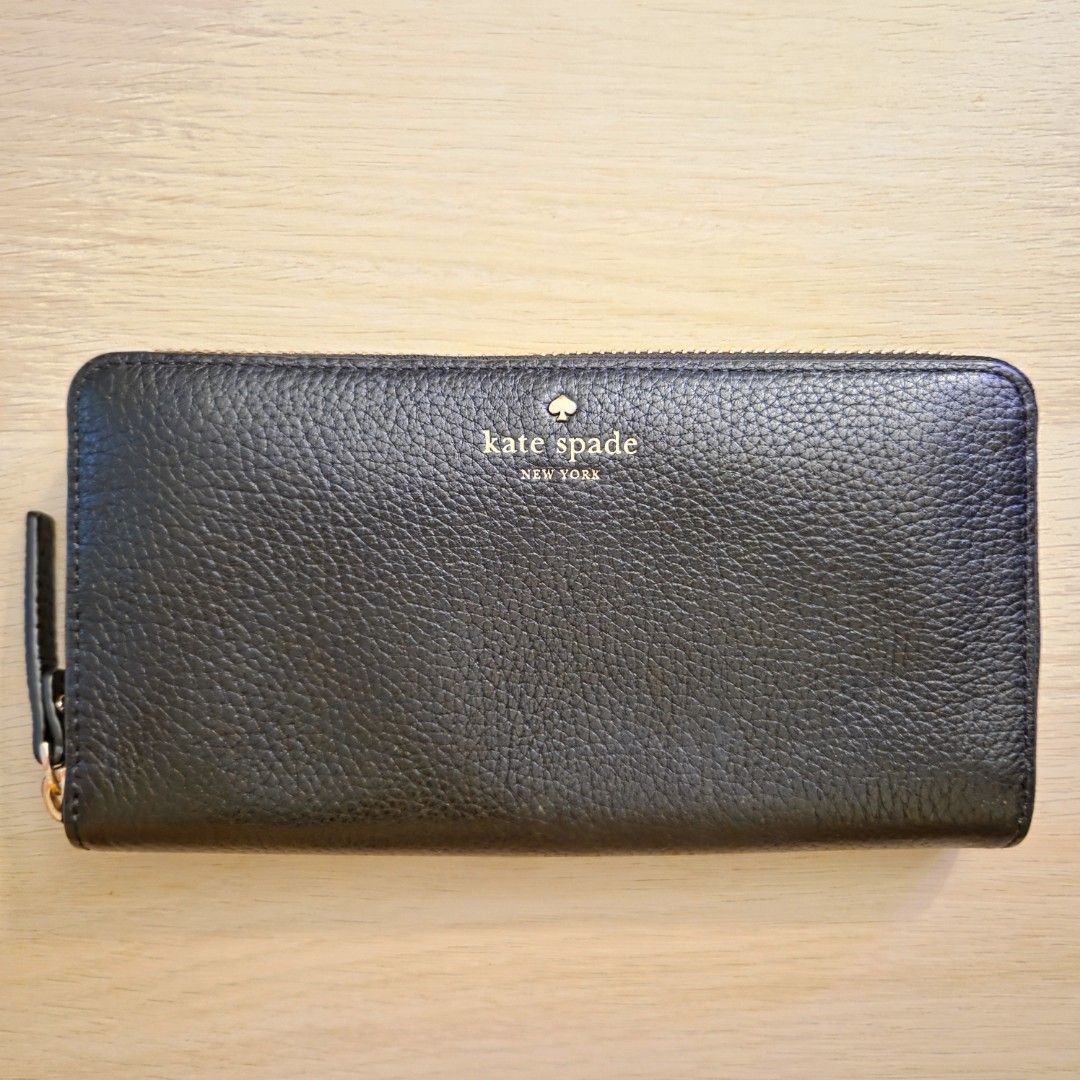 Kate Spade | Cobble Hill Lacey Wallet (Black) (Category: Luxury Bags & Wallets) located in Quezon City. Submitted by m3262 (Listing ID 1358900622, Image 1). Description: • Never used; slightly old but in excellent condition • Guaranteed authentic; purchased from an official Kate Spade store in Hong Kong • No box included RFS: Decluttering Product details: • Dimensions: 19.6 x 11 x 2 cm • Continental wallet with pebble leather design. • 1 main zip