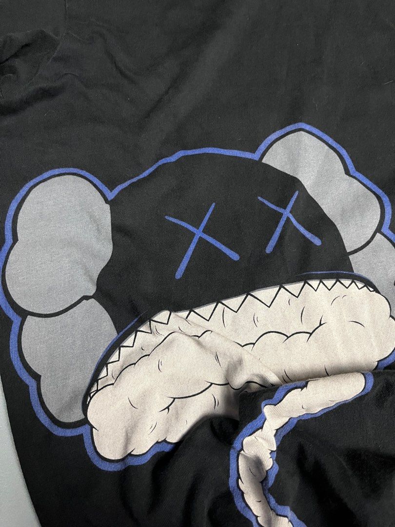 Kaws Uniqlo (Category: Tshirts & Polo Shirts ) located in Cebu City. Submitted by myspacebarisbroken (Listing ID 1358885172, Image 2). Description: Very Good condition Small Width: 18 Length: 27 Issue: need wash only.