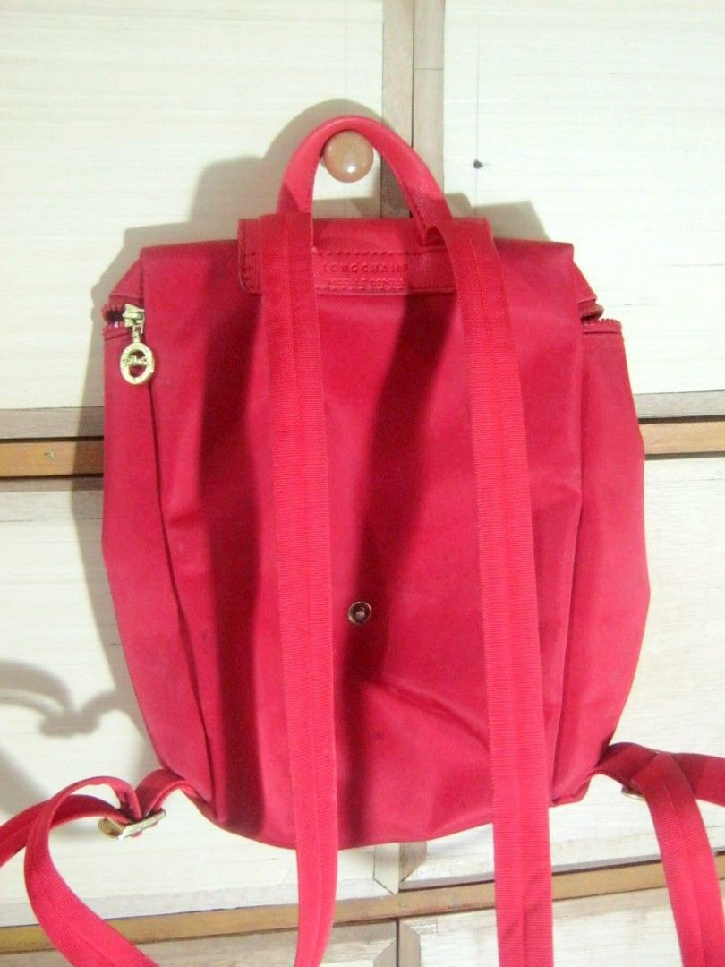 Longchamp Backpack (Category: Luxury Bags & Wallets) located in Quezon City. Submitted by thisisnotj (Listing ID 1358805263, Image 2). Description: red longchamp backpack MOP: Gcash location: Quezon City j&t, meet up lrt.