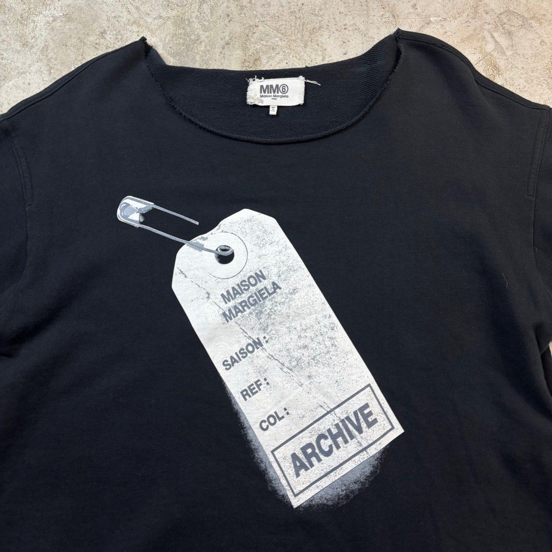 Maison Margiela Archive Oversized T-Shirt (Category: Activewear) located in Caloocan City. Submitted by thrift.crcl (Listing ID 1358782330, Image 3). Description: Maison Margiela Archive Oversized T-Shirt Tagged sized: Larege Condition: Good condition Flaws: No flaws Material: 100% Cotton Made in: Italy Dimension: Length: 28 Width: 23 Shoulder: 22 Sleeve: 8.