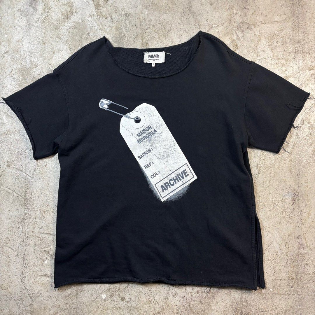 Maison Margiela Archive Oversized T-Shirt (Category: Activewear) located in Caloocan City. Submitted by thrift.crcl (Listing ID 1358782330, Image 1). Description: Maison Margiela Archive Oversized T-Shirt Tagged sized: Larege Condition: Good condition Flaws: No flaws Material: 100% Cotton Made in: Italy Dimension: Length: 28 Width: 23 Shoulder: 22 Sleeve: 8.