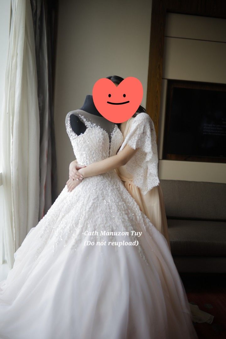 MARK BRIDE'S MANILA WEDDING GOWN (Category: Evening dresses & gowns) located in Caloocan City. Submitted by manuzca (Listing ID 1358754803, Image 2). Description: Hi future brides! I'm letting go of my beautiful custom-made gown by Mark Bride's Manila. This was just used last Feb 9, 2025. It was designed to make an illusion that doesn't highlight my broad shoulders (that was my main concern kasi when we finalized the design). Original Price: 6X,X